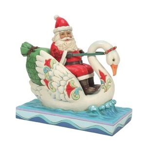 Jim Shore Santa Riding White Swan Sleigh with Red, Green & Blue Accents